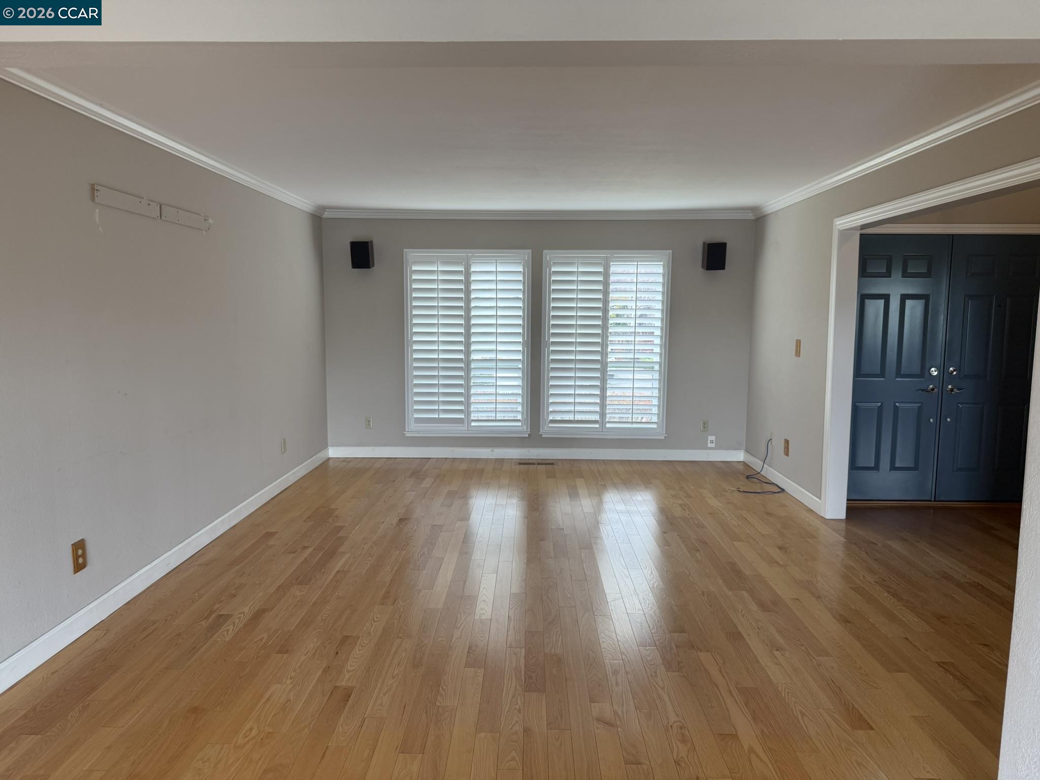 1109 Vista Point Lane Concord, CA 94521 - Photo 10 of 26 an empty room with wooden floor and windows