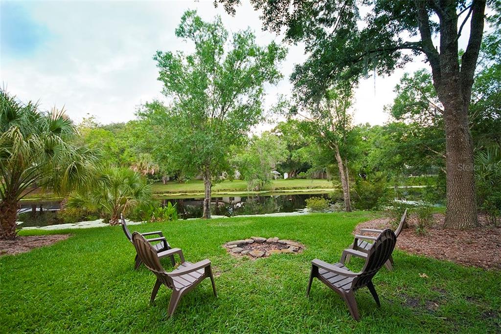 2251 Shadow Oaks Road Sarasota, FL 34240 - Photo 14 of 14 Back yard and pond view