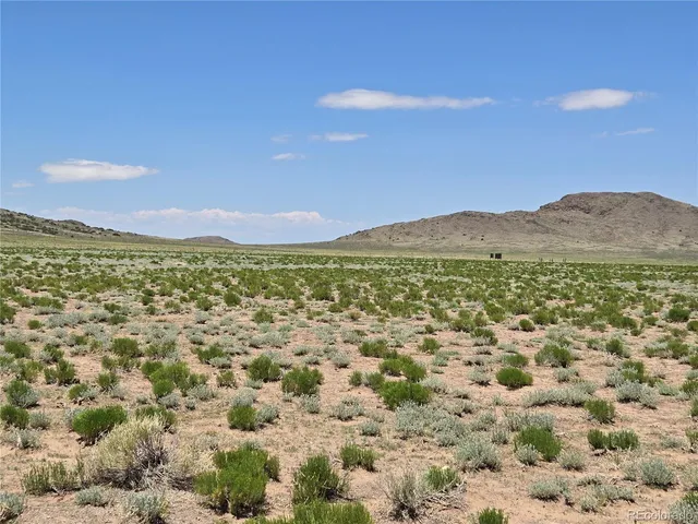 a view of a city & mountain