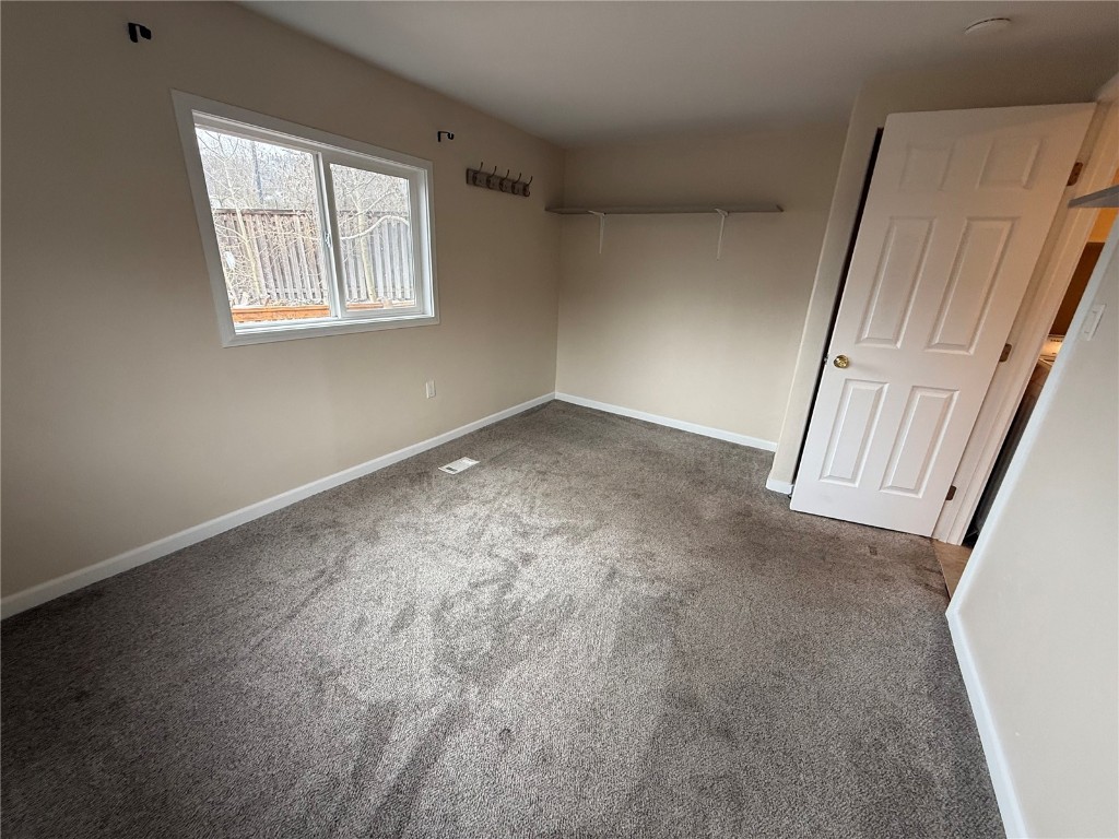 847 Airport Road, Unit 4 Breckenridge, CO 80424 - Photo 20 of 32 an empty room with windows