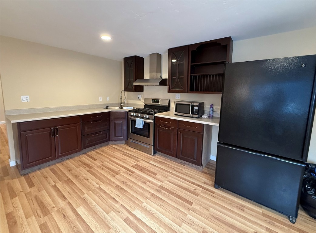 847 Airport Road, Unit 4 Breckenridge, CO 80424 - Photo 2 of 32 a kitchen with stainless steel appliances granite countertop a refrigerator a stove top oven a sink and dishwasher