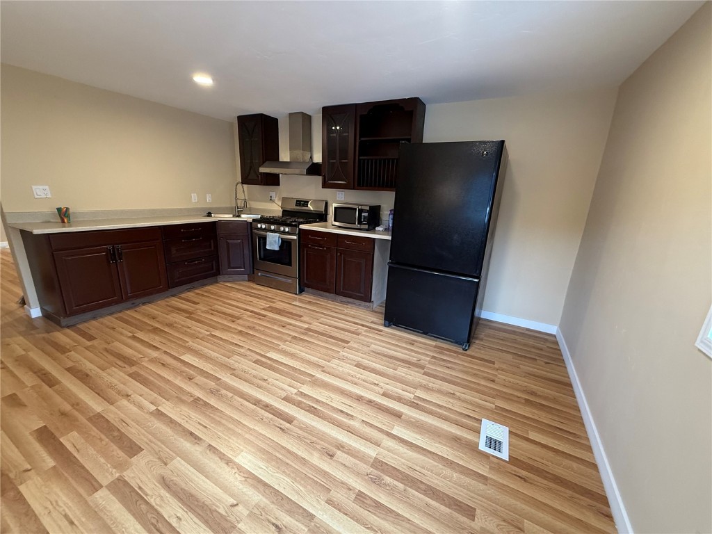 847 Airport Road, Unit 4 Breckenridge, CO 80424 - Photo 5 of 32 a kitchen with stainless steel appliances granite countertop a refrigerator and a sink