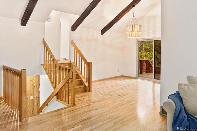 a view of entryway and kitchen