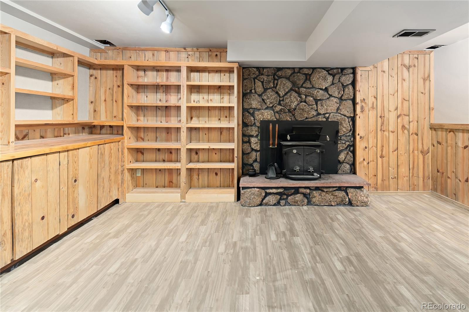 28696 Little Big Horn Drive Evergreen, CO 80439 - Photo 27 of 47 a view of a livingroom with furniture and staircase