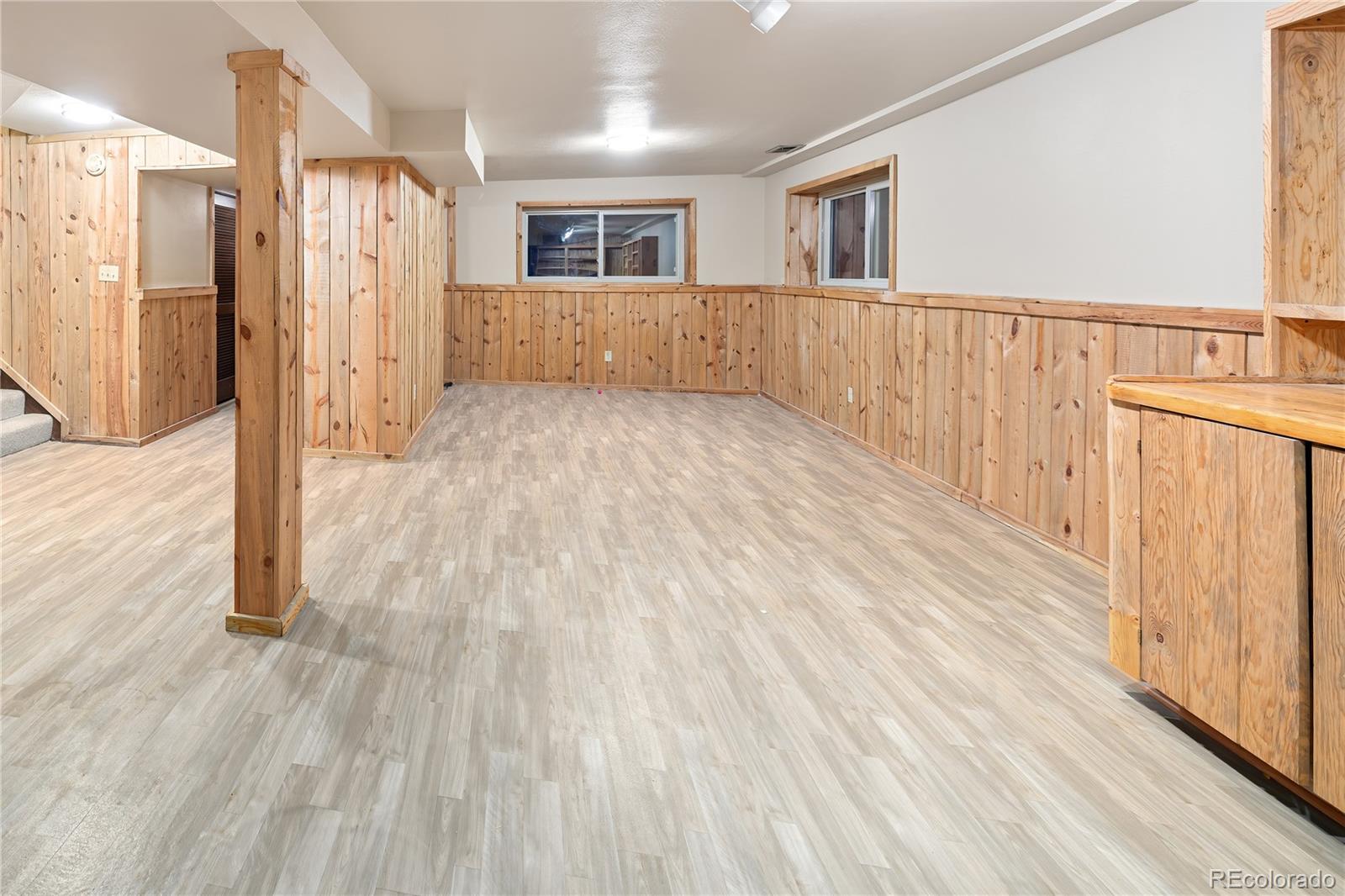 28696 Little Big Horn Drive Evergreen, CO 80439 - Photo 30 of 47 a view of hallway with wooden floor