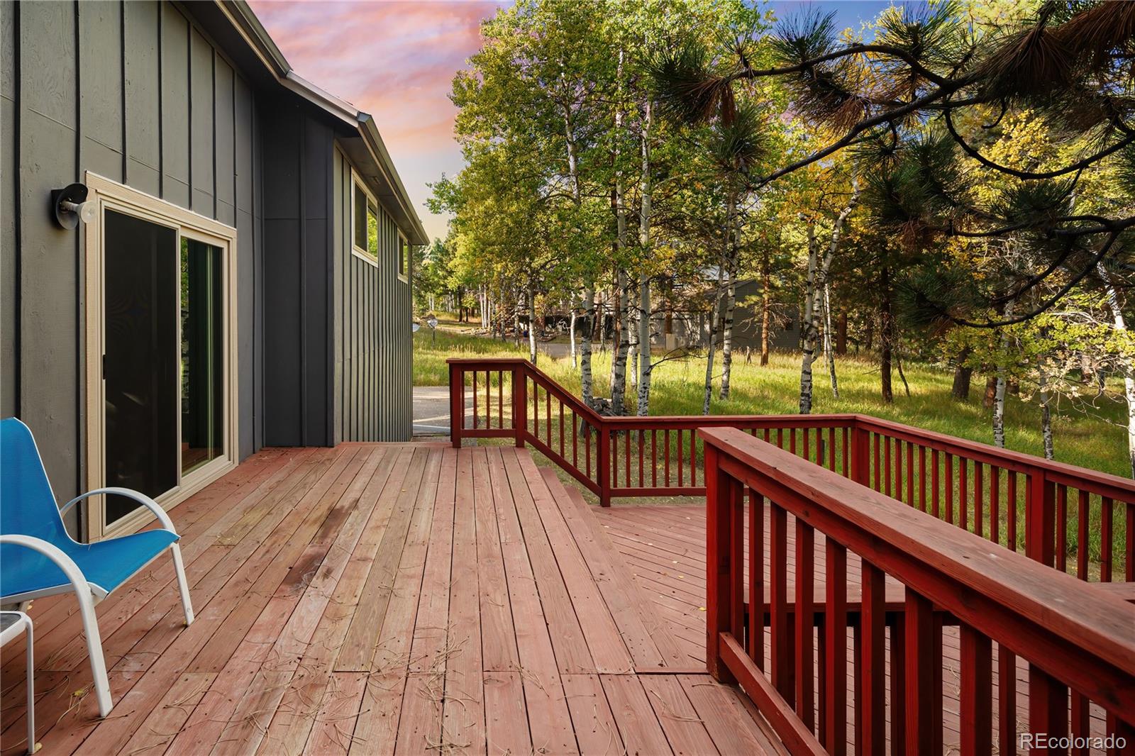 28696 Little Big Horn Drive Evergreen, CO 80439 - Photo 35 of 47 a view of balcony with wooden floor and fence