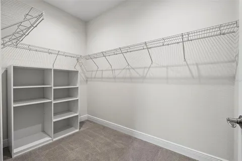 a view of a room with racks on the wall