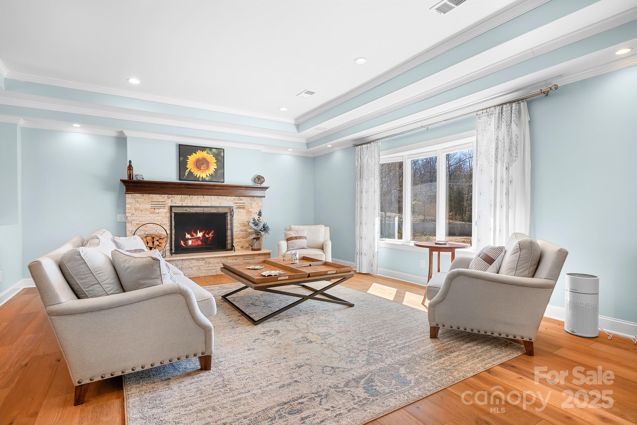 19320 Davidson-Concord Road Davidson, NC 28036 - Photo 4 of 33 a living room with furniture and a fireplace