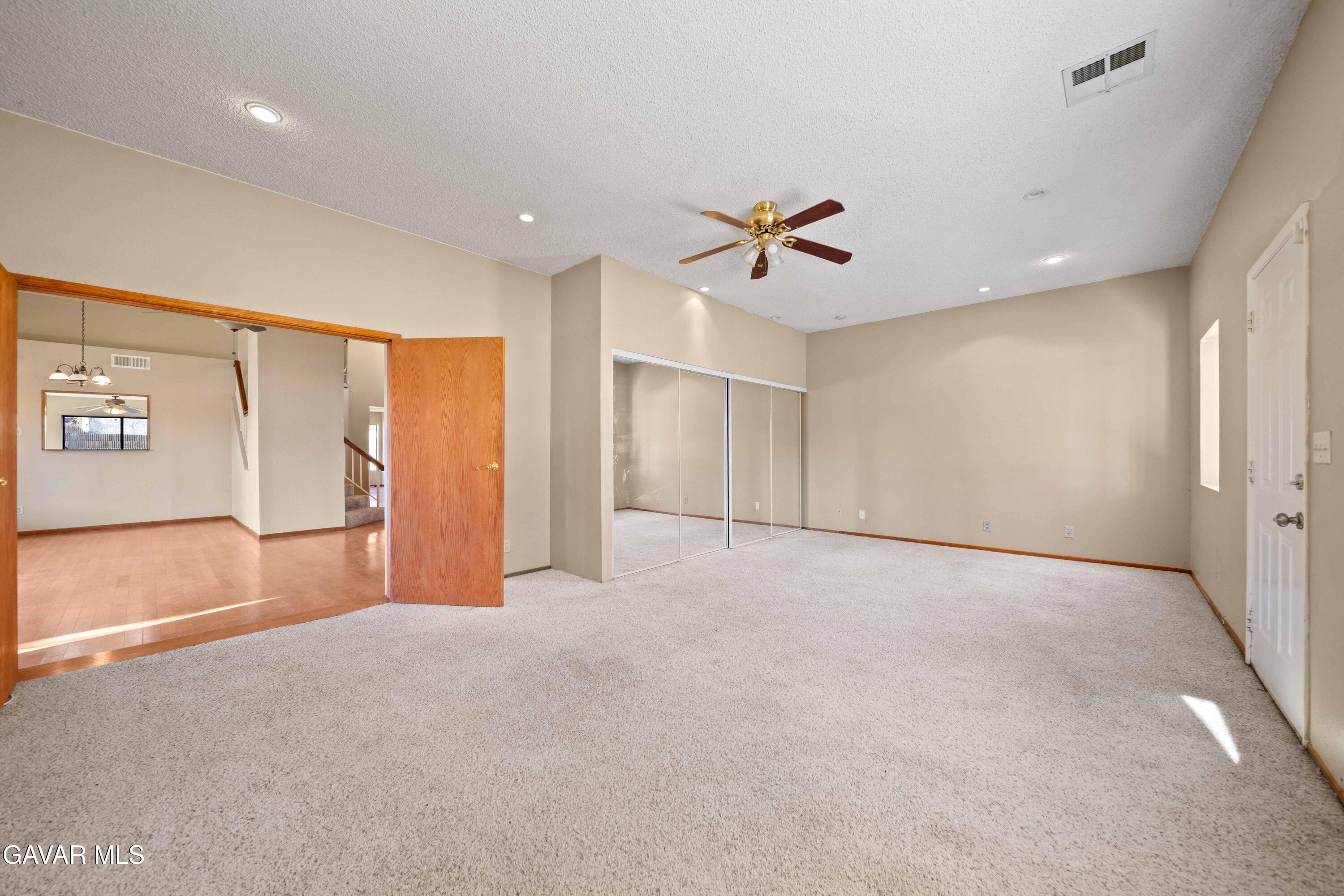 44200 Galion Avenue Lancaster, CA 93536 - Photo 21 of 42 a view of an empty room with a window