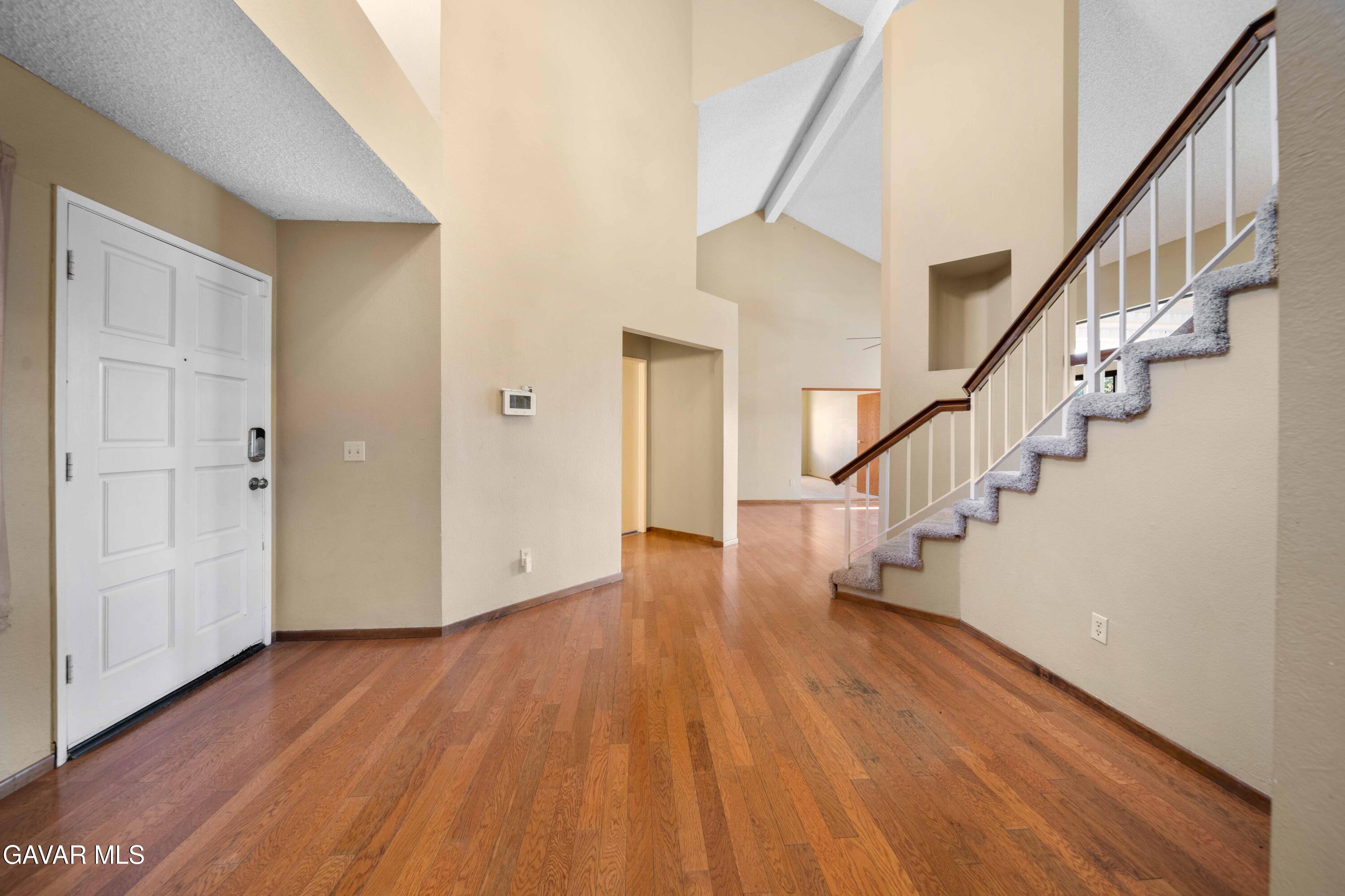 44200 Galion Avenue Lancaster, CA 93536 - Photo 5 of 42 a view of entryway with wooden floor