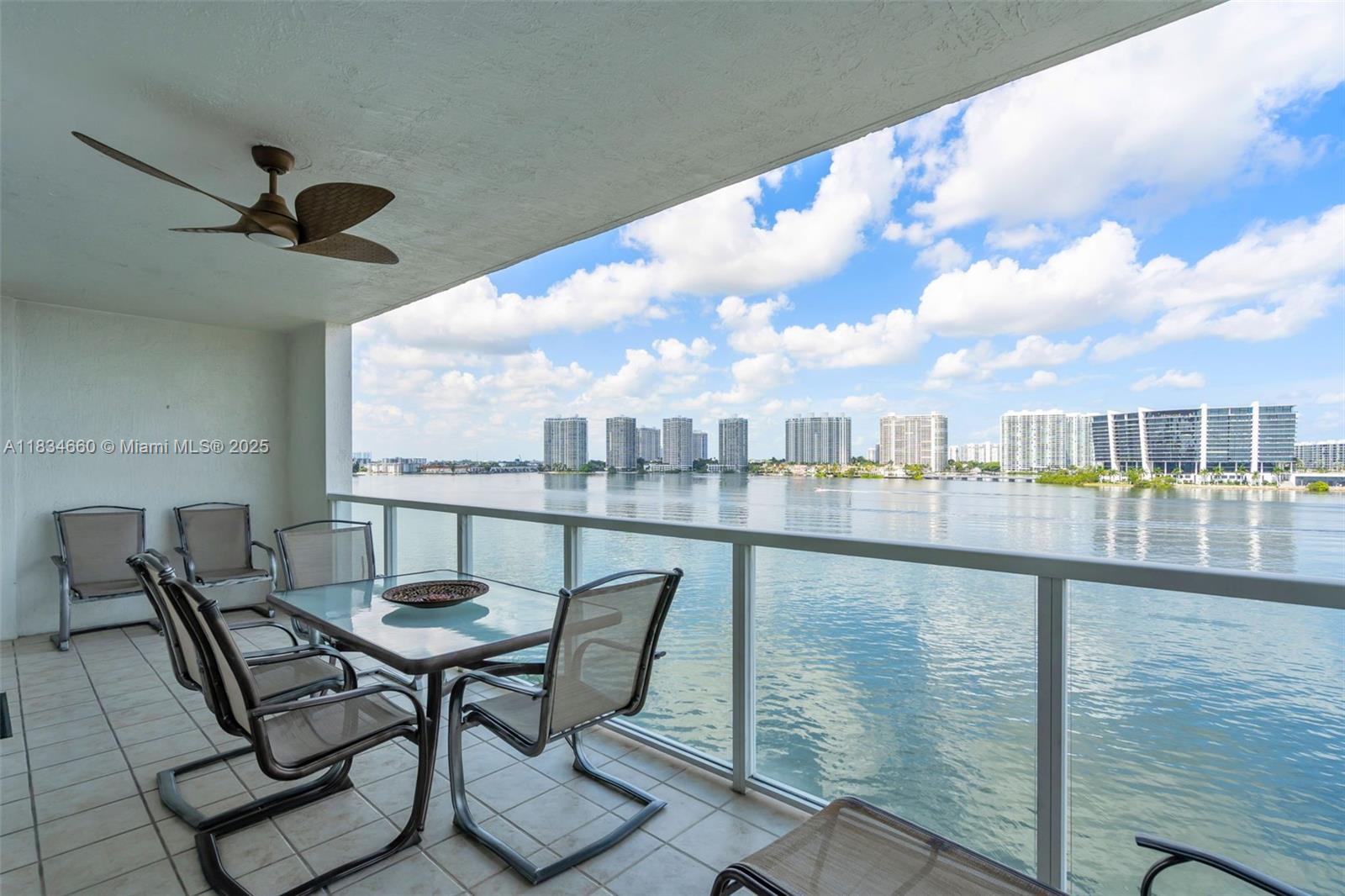 18100 North Bay Road, Unit 709 Sunny Isles Beach, FL 33160 - Photo 27 of 33 a view of a balcony with furniture