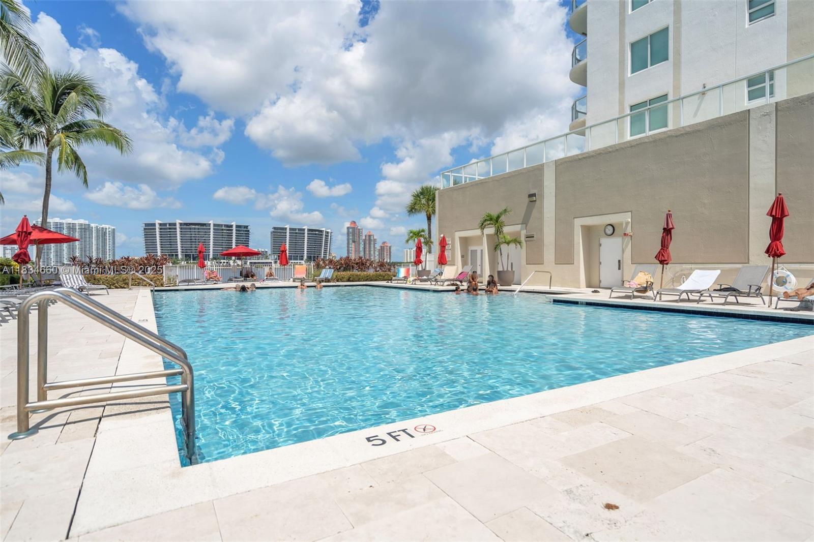 18100 North Bay Road, Unit 709 Sunny Isles Beach, FL 33160 - Photo 32 of 33 a view of a house with a yard