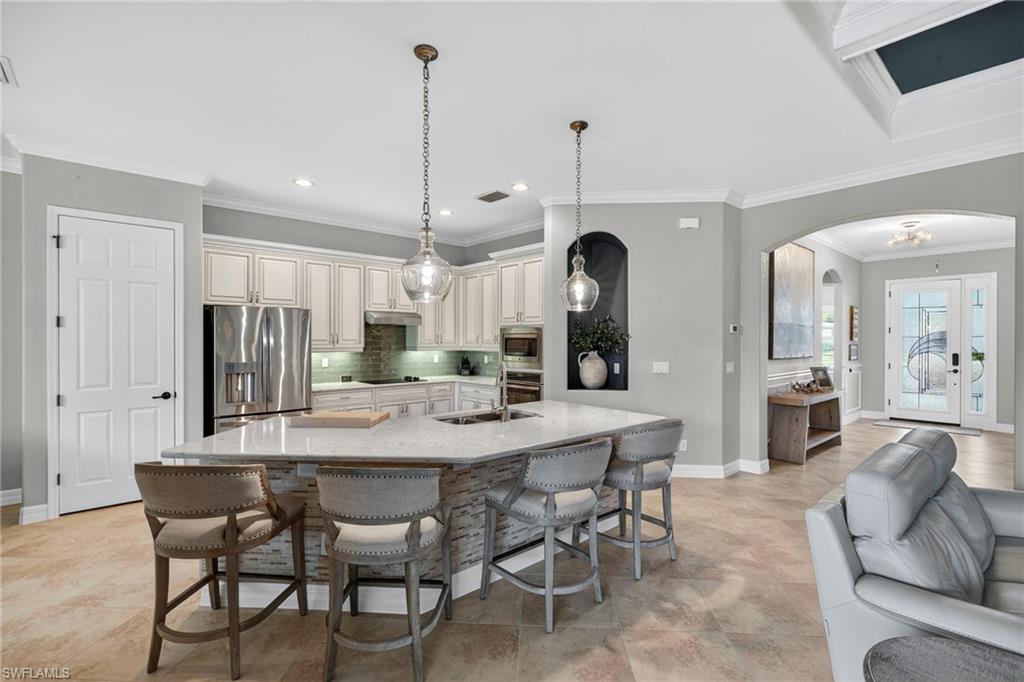 9352 Vercelli Court Naples, FL 34113 - Photo 14 of 49 a view of a dining room and livingroom view
