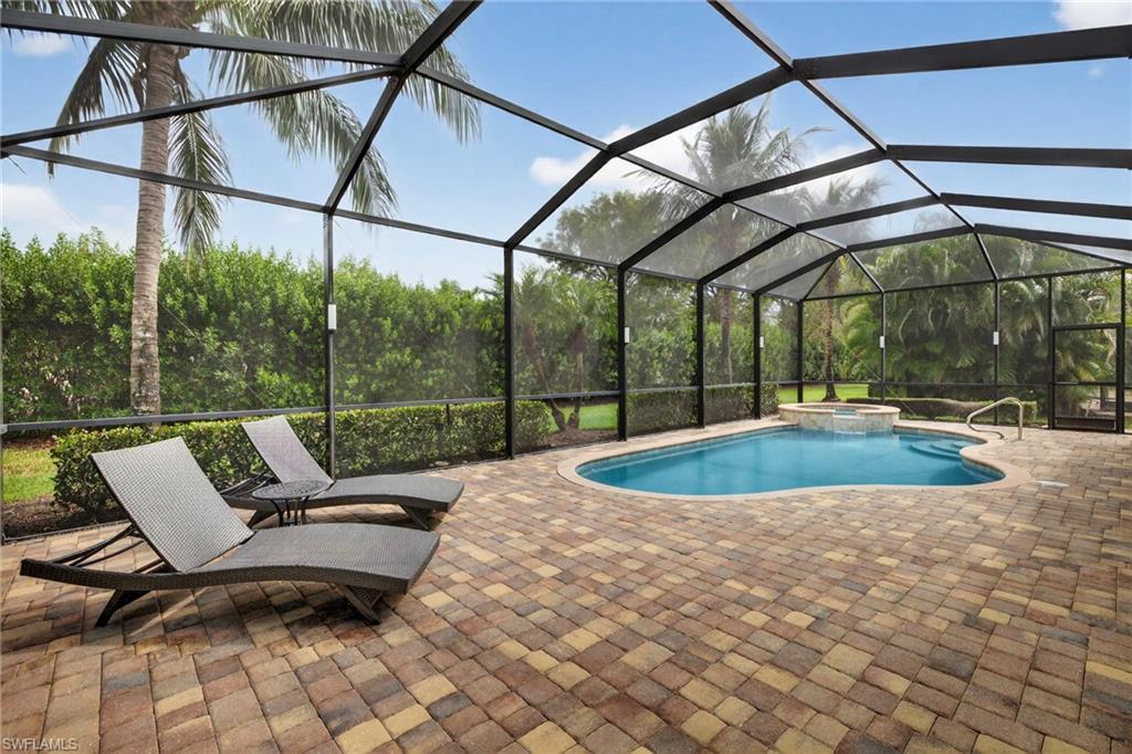 9352 Vercelli Court Naples, FL 34113 - Photo 37 of 49 a view of outdoor space with swimming pool