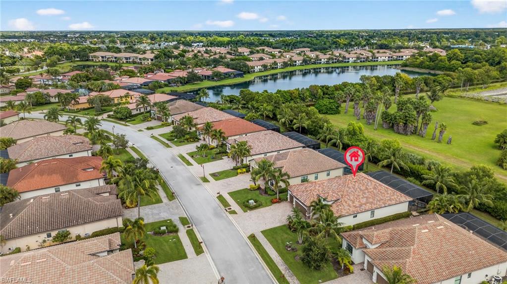 9352 Vercelli Court Naples, FL 34113 - Photo 43 of 49 an aerial view of residential houses with outdoor space and river
