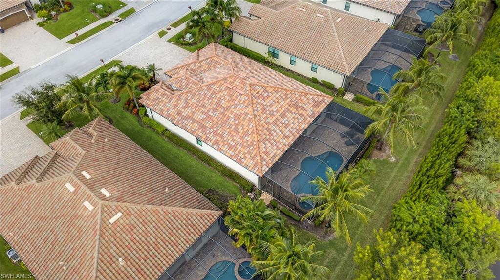 9352 Vercelli Court Naples, FL 34113 - Photo 45 of 49 a view of a backyard