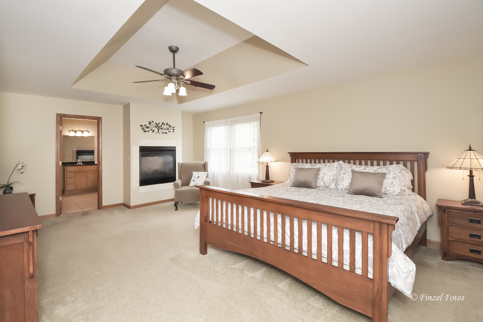 7N355 Ridge Line Road St. Charles, IL 60175 - Photo 15 of 38 a bedroom with a bed and a ceiling fan