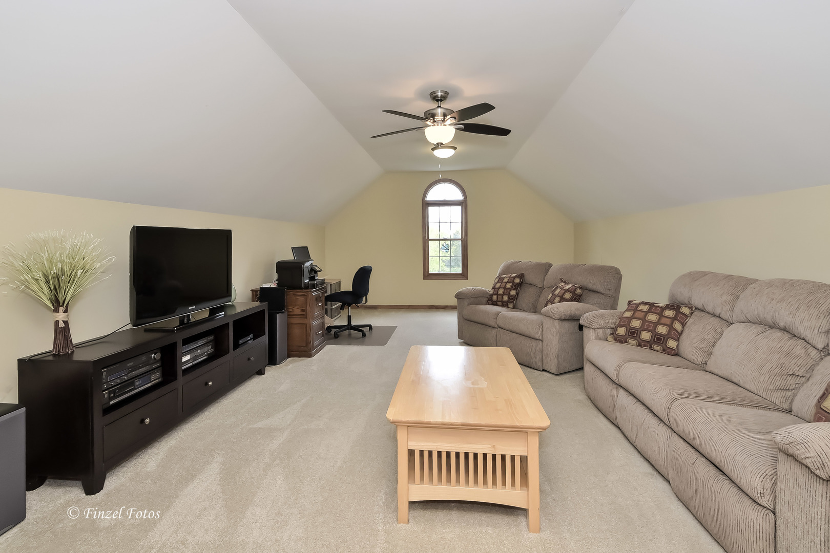 7N355 Ridge Line Road St. Charles, IL 60175 - Photo 17 of 38 a living room with furniture a chandelier and a flat screen tv