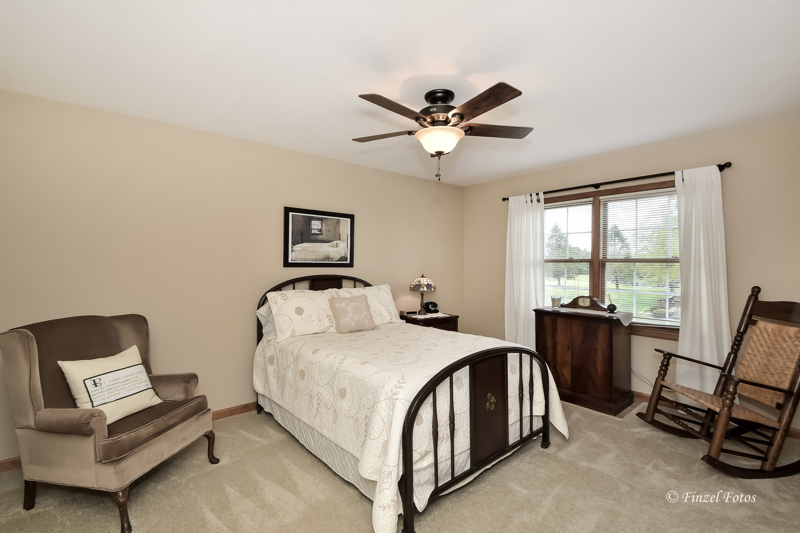 7N355 Ridge Line Road St. Charles, IL 60175 - Photo 18 of 38 a bedroom with a bed a couch and a large window