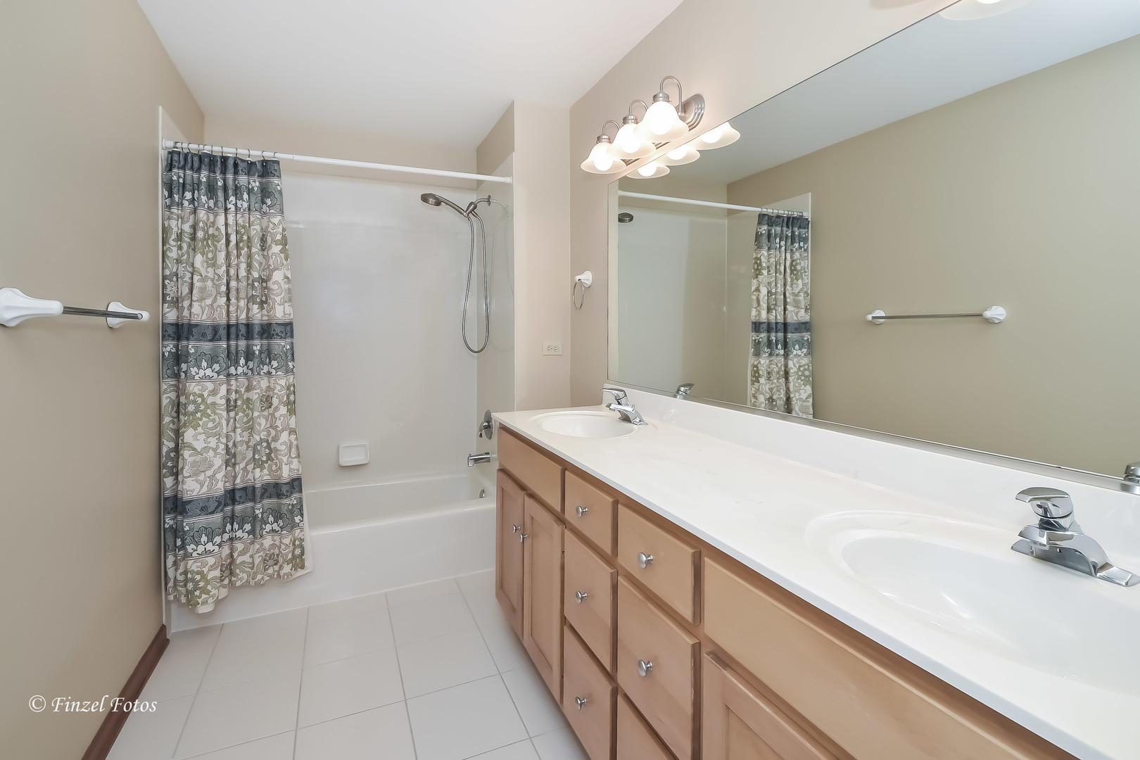 7N355 Ridge Line Road St. Charles, IL 60175 - Photo 21 of 38 a spacious bathroom with a shower sink and mirror