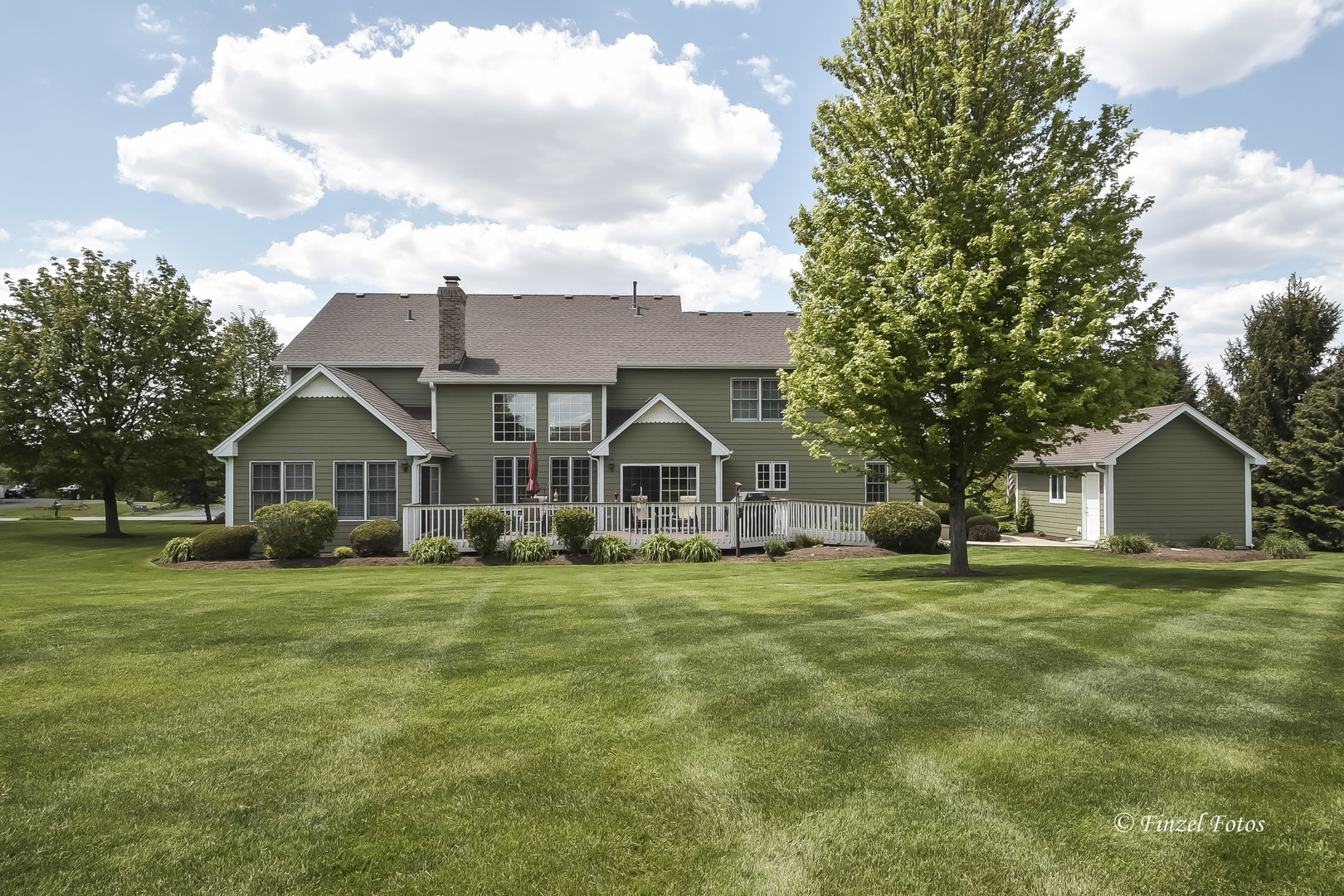 7N355 Ridge Line Road St. Charles, IL 60175 - Photo 24 of 38 a view of a house with a big yard and large trees