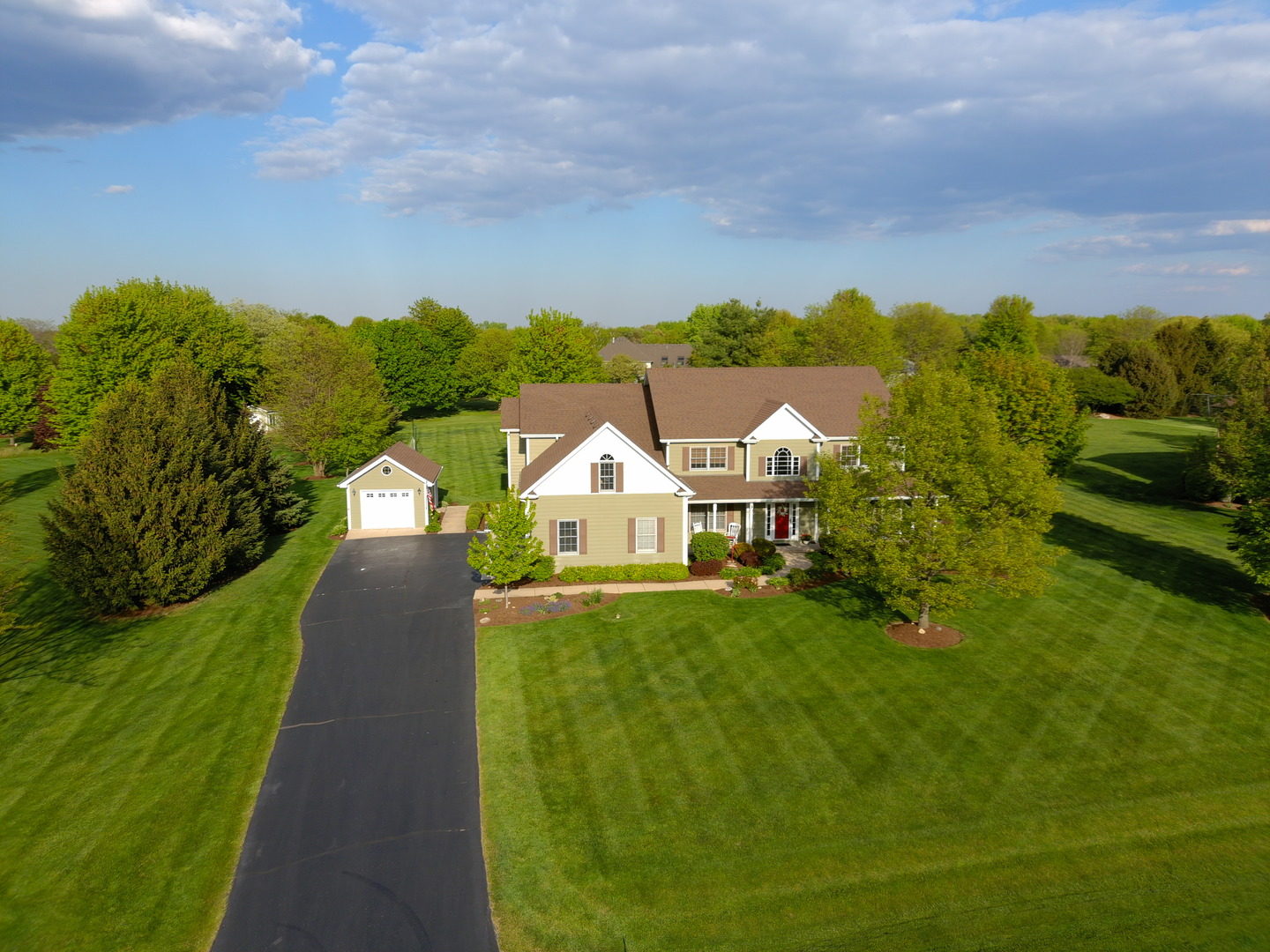7N355 Ridge Line Road St. Charles, IL 60175 - Photo 31 of 38 a front view of a house with a yard