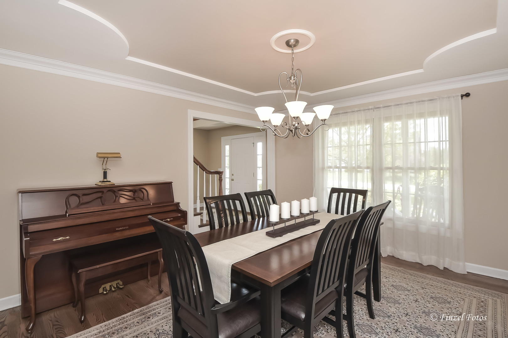7N355 Ridge Line Road St. Charles, IL 60175 - Photo 10 of 38 a view of a dining room with furniture a chandelier and wooden floor