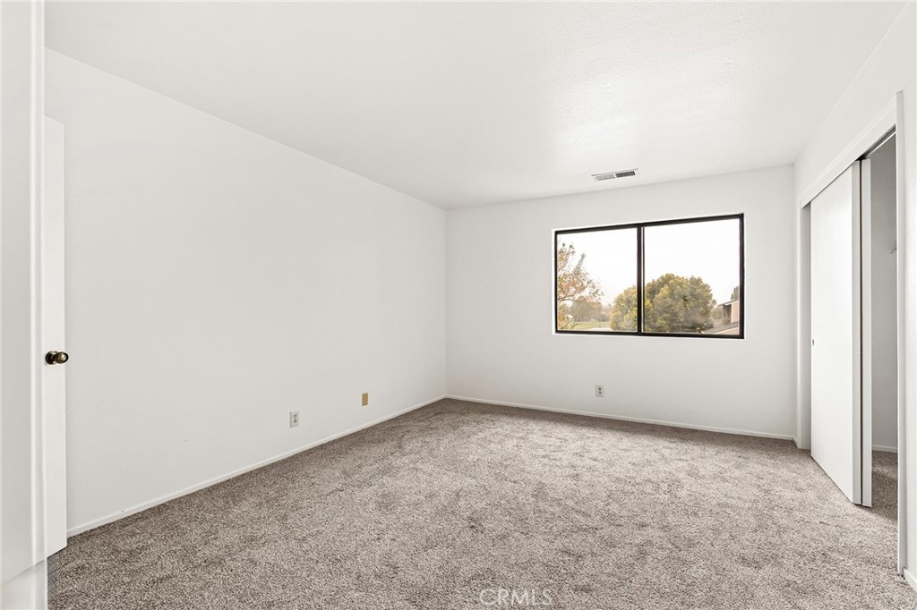 585 North Street Corning, CA 96021 - Photo 19 of 41 an empty room with windows