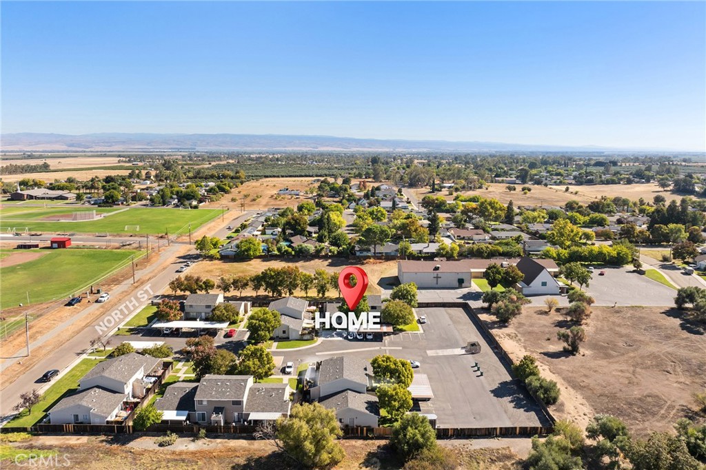 585 North Street Corning, CA 96021 - Photo 27 of 41 an aerial view of residential building and lake