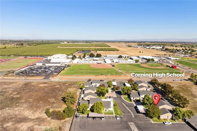 a view of a parked cars in front of a house
