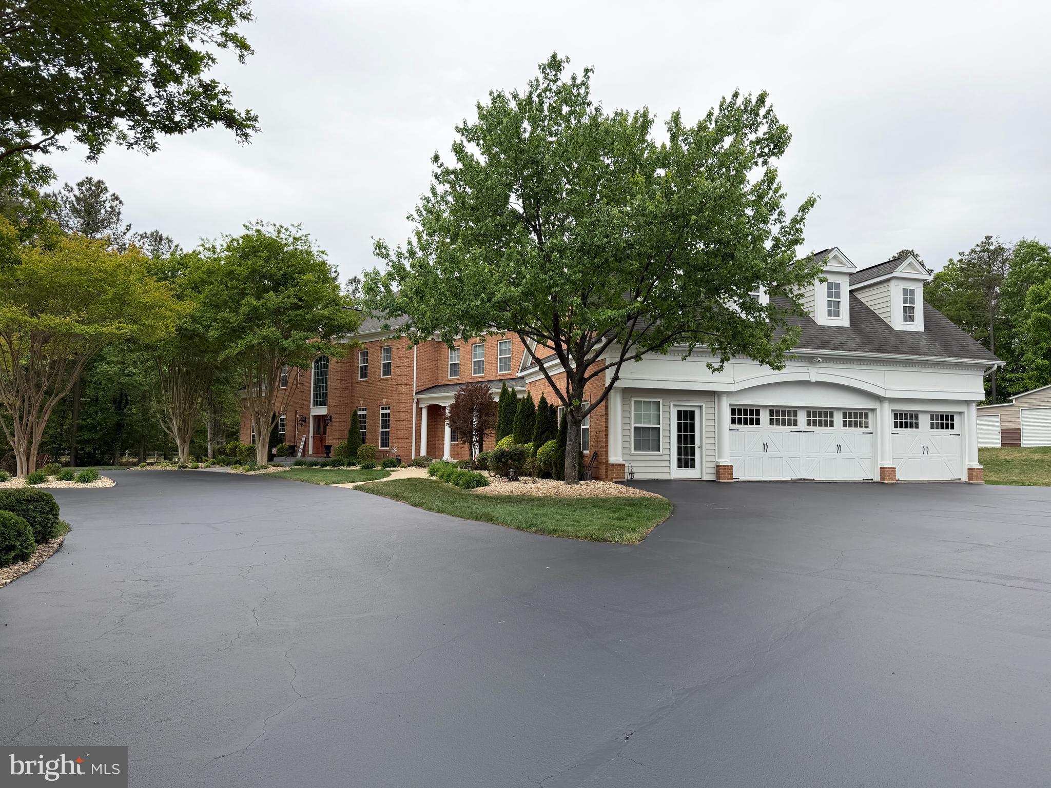 4100 Hidden Creek Road Port Republic, MD 20676 - Photo 2 of 10 Attached 3 car garage plus two more buildings