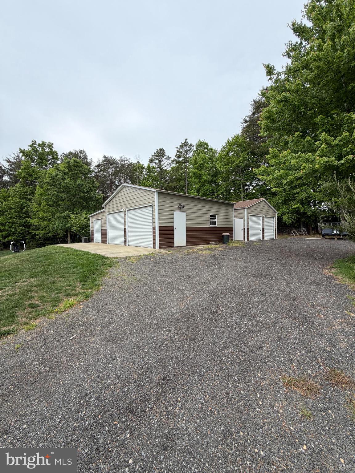 4100 Hidden Creek Road Port Republic, MD 20676 - Photo 9 of 10 Two large outbuildings, shop and garage spaces