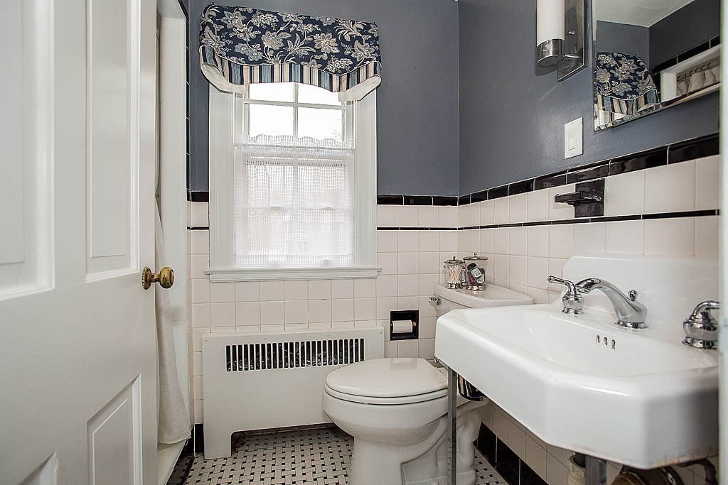 10 Standish Road Milton, MA 02186 - Photo 21 of 27 a bathroom with a sink toilet and a mirror