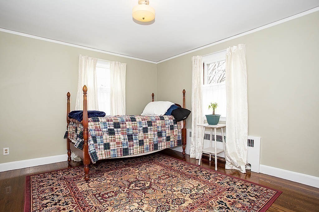 10 Standish Road Milton, MA 02186 - Photo 23 of 27 a bed room with a bed and a window