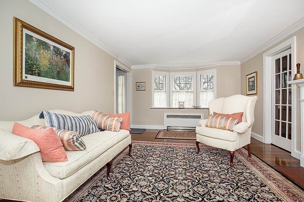 10 Standish Road Milton, MA 02186 - Photo 9 of 27 a living room with furniture and a rug