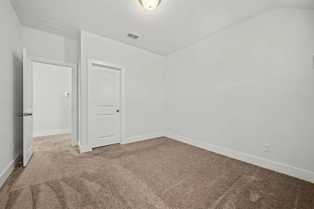 a brick building with a bench and a bench