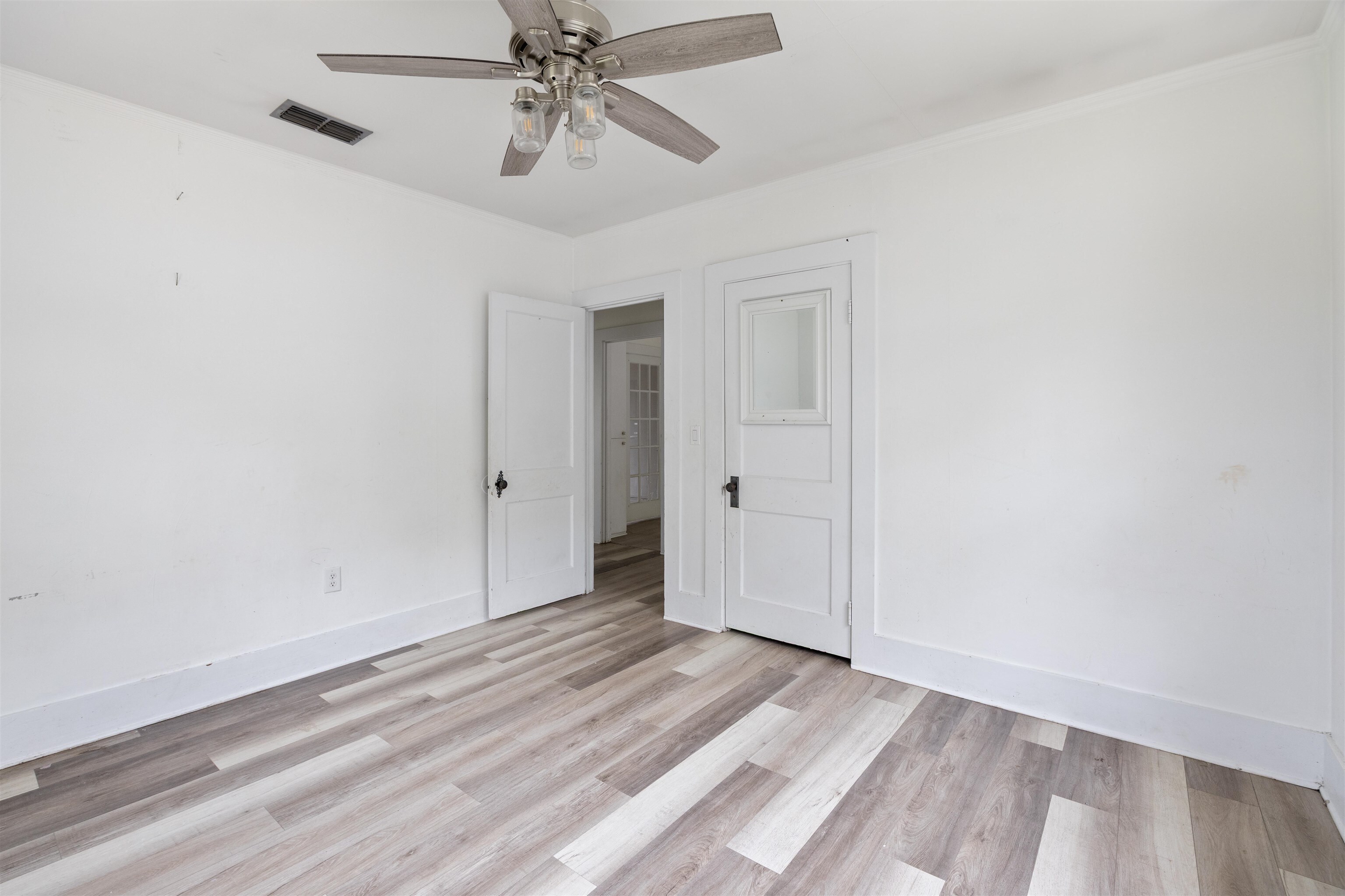 112 South Juniper Street Foley, AL 36535 - Photo 27 of 64 Spare room featuring light wood finished floors and ceiling fan