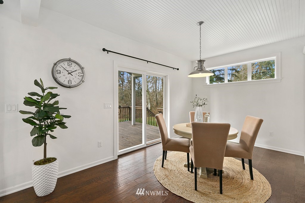 3402 Walsh Road Snohomish, WA 98290 - Photo 12 of 33 a view of a dining room with furniture window and wooden floor