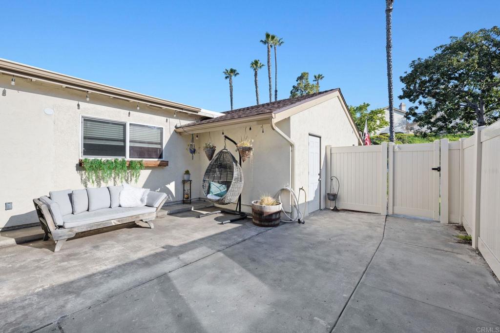 3681 Harvard Drive Oceanside, CA 92056 - Photo 13 of 30 a view of a house with backyard and furniture