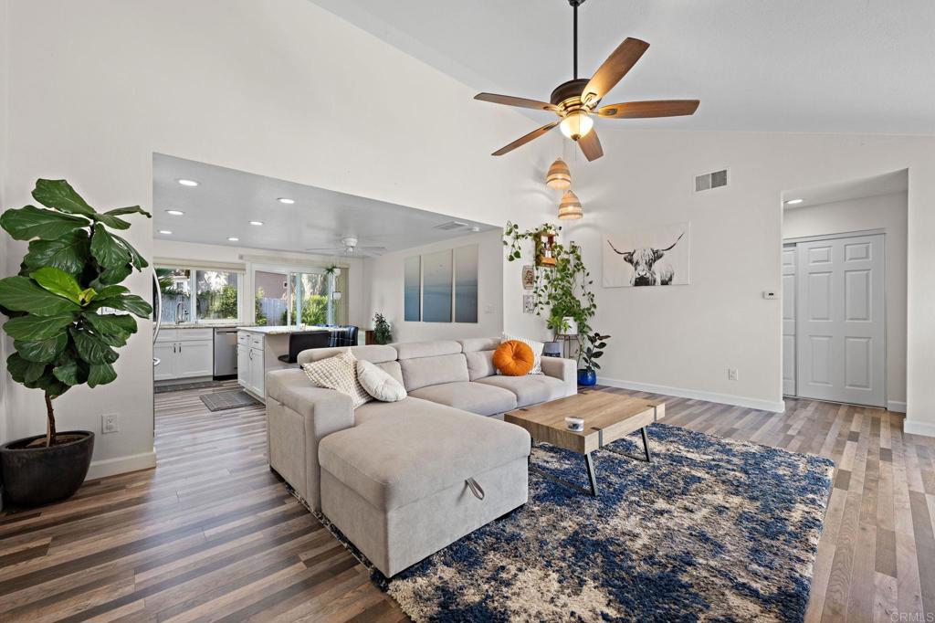 3681 Harvard Drive Oceanside, CA 92056 - Photo 4 of 30 a living room with couches and a potted plant