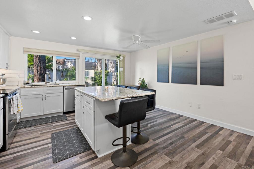 3681 Harvard Drive Oceanside, CA 92056 - Photo 9 of 30 a living room with furniture and a large window