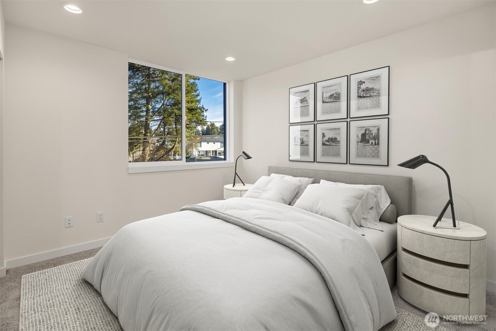 18017 2nd Avenue Northeast, Unit B Seattle, WA 98155 - Photo 12 of 19 a bedroom with a bed and a window
