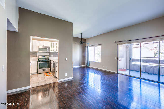 1766 Sinaloa Road, Unit 279 Simi Valley, CA 93065 - Photo 8 of 23 a view of a big room with wooden floor and windows