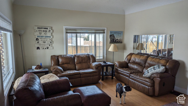 1341 East Crk Road Sandy, UT 84093 - Photo 18 of 24 Living room with wood finished floors