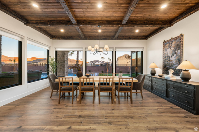 4871 South Homestead Way Washington, UT 84780 - Photo 30 of 151 Dining space with a wooden ceiling with exposed beams, suspended lighting, and hardwood / wood-style floors