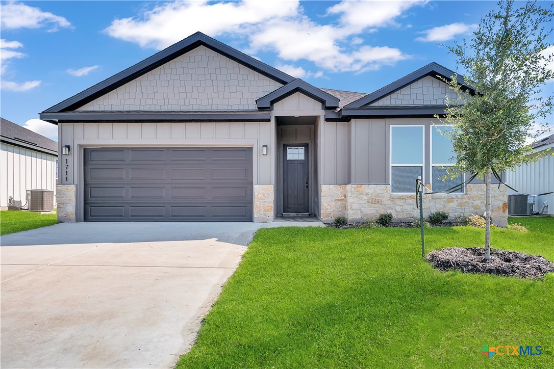 Please note: These exterior photos are not of the actual home but are from a previously completed home with a similar floor plan. Finishes, features, and layout may vary.*
