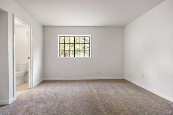 an empty room with a window