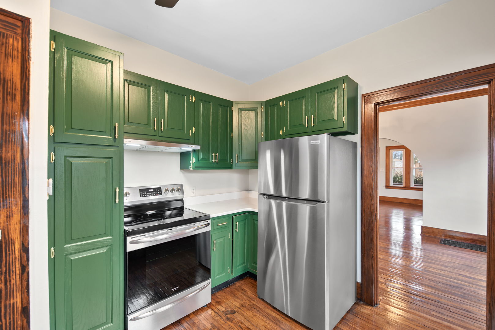 1065 South Poplar Avenue Kankakee, IL 60901 - Photo 11 of 17 a kitchen with stainless steel appliances granite countertop a refrigerator and a stove top oven