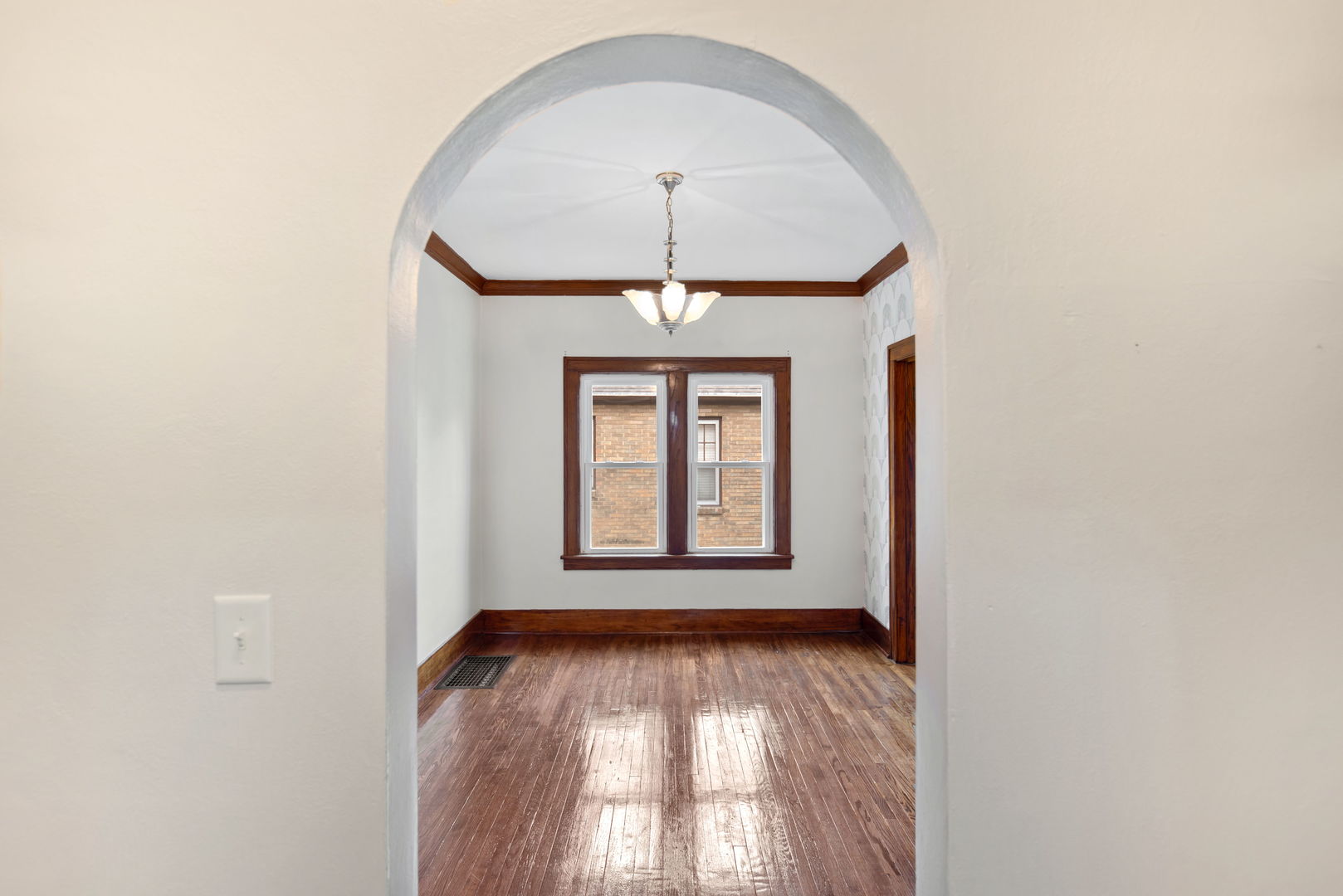 1065 South Poplar Avenue Kankakee, IL 60901 - Photo 12 of 17 a view of empty room with a large window