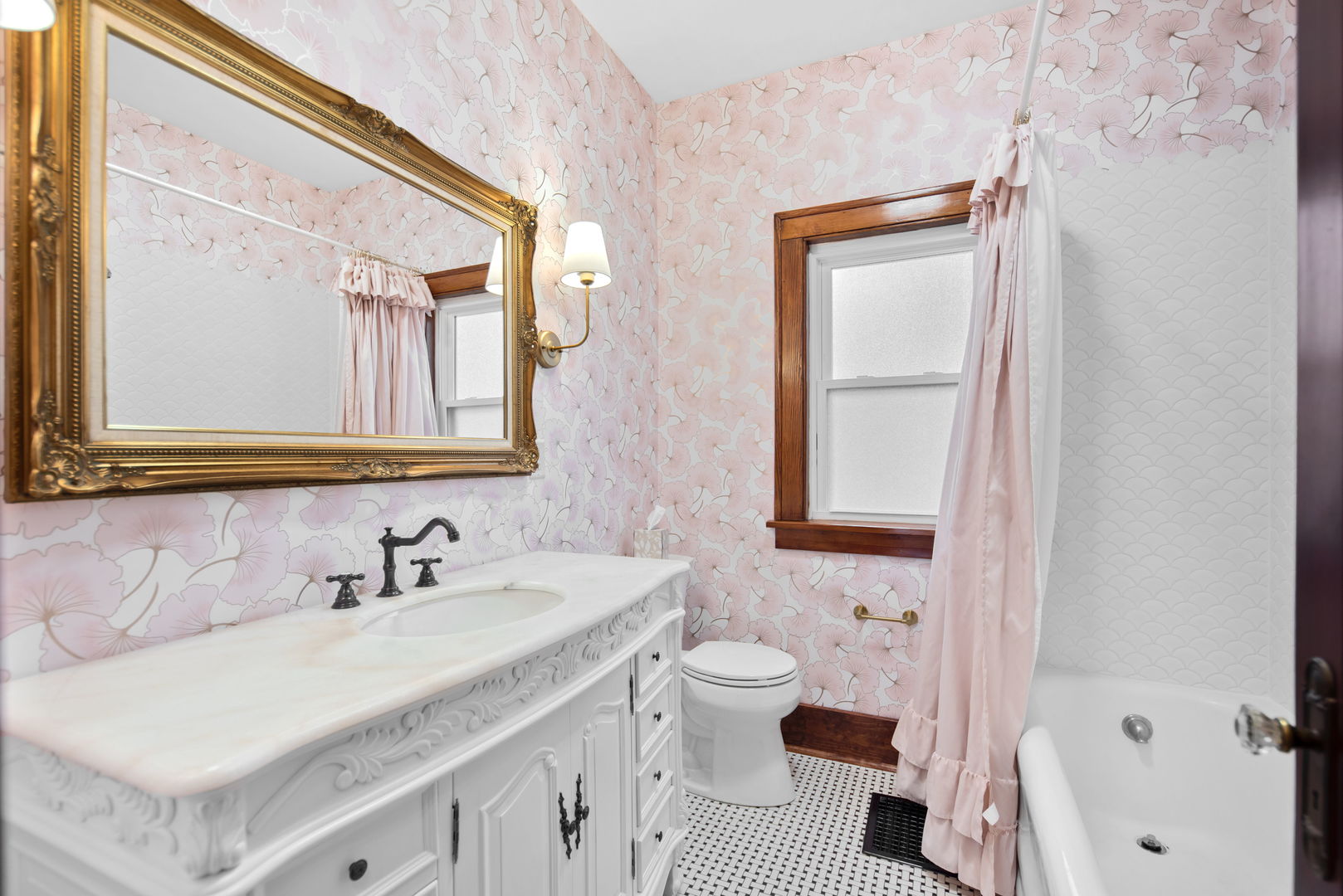 1065 South Poplar Avenue Kankakee, IL 60901 - Photo 14 of 17 a bathroom with a sink a toilet and a mirror